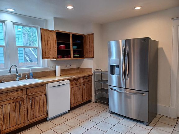 Large open kitchen with 2 full size fridges, upgraded appliances
