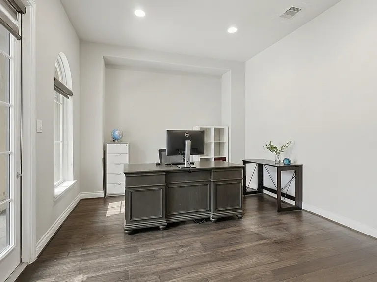 Home office with separate French Door exit to the courtyard