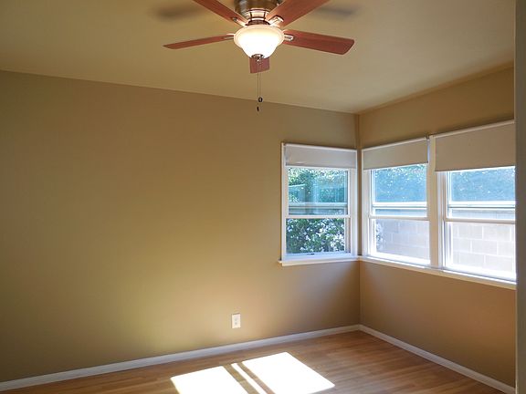 Front bedroom with new ceiling fan
