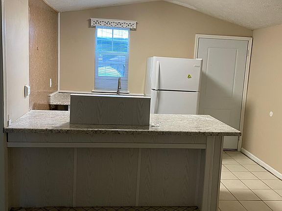 Open Kitchen with vaulted ceiling