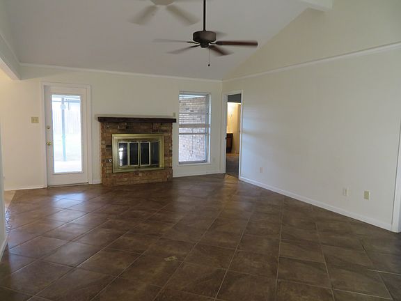 Living room adjacent to dining area