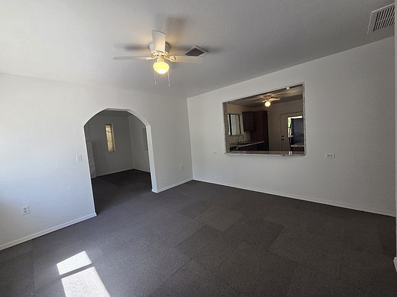 dining room with kitchen pass through.