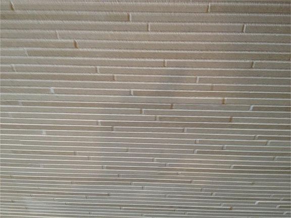 Close up view of the front finish of the kitchen island.