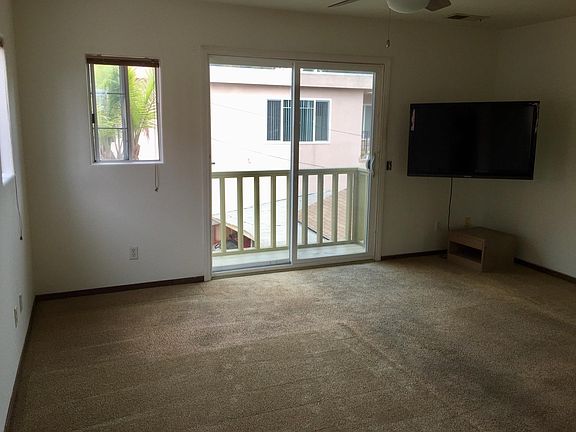 Includes a wall mounted flat screen TV
