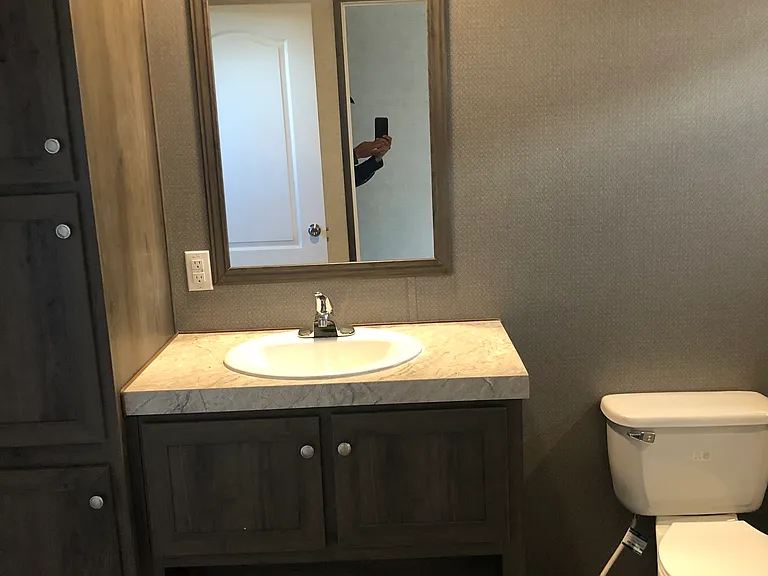Master vanity with tons of cabinet space.