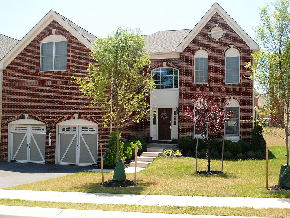 Brick-front Colonial by Toll Brothers