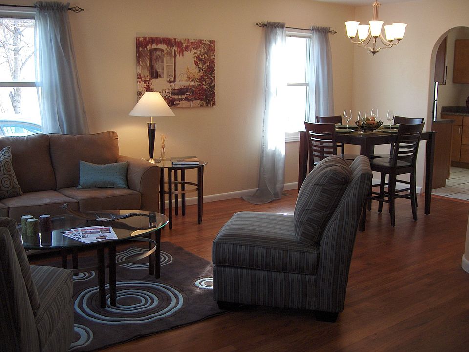 Huge living and dining area with hardwood floors and lots of natural light. 
