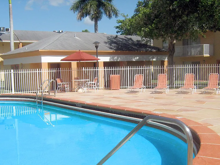 Colonial Village - 7550 Stirling Rd — Photo 40