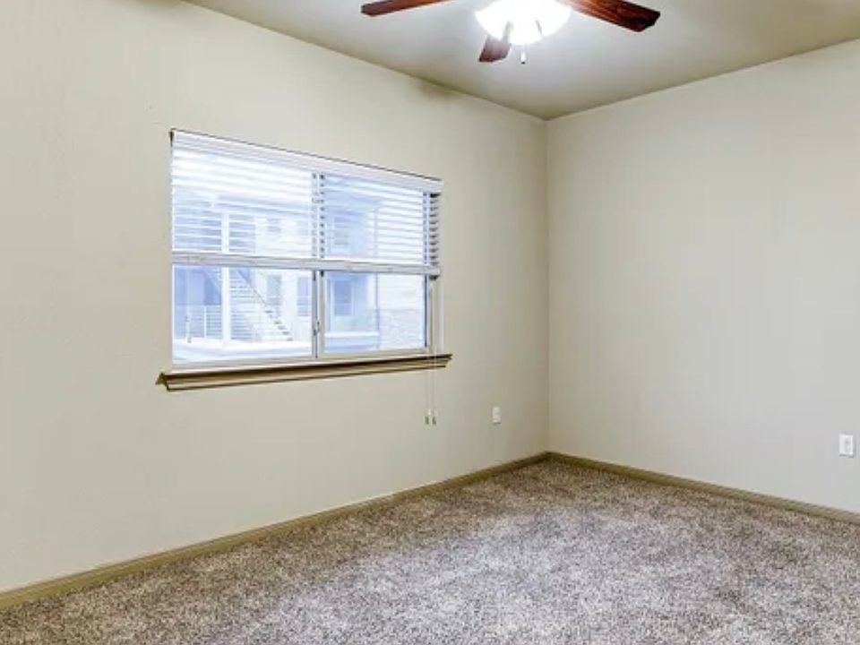 Bedroom (Window looks out toward inside of complex)