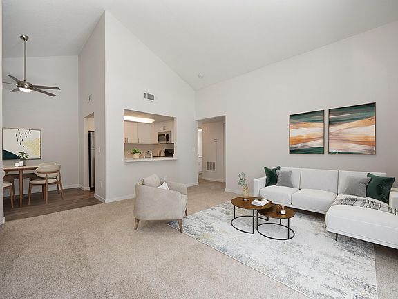 Living room with vaulted ceilings