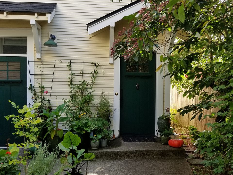 Private front porch and entrance to your upstairs Nest apartment, with private address.