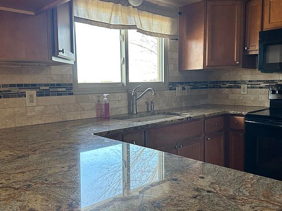 5th image of 32011 School Section Rd