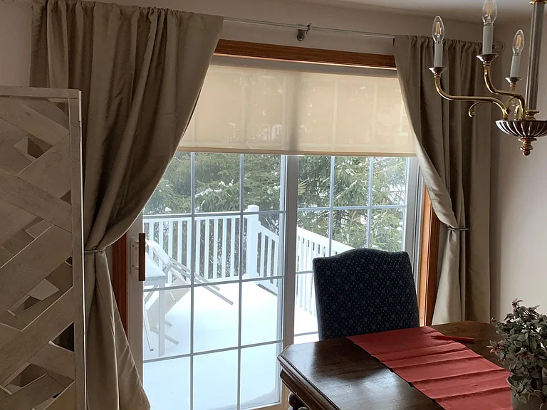Dining room that leads to the deck silk curtains