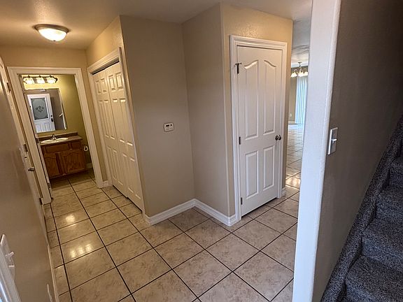 Entry looking to half bath on main level.