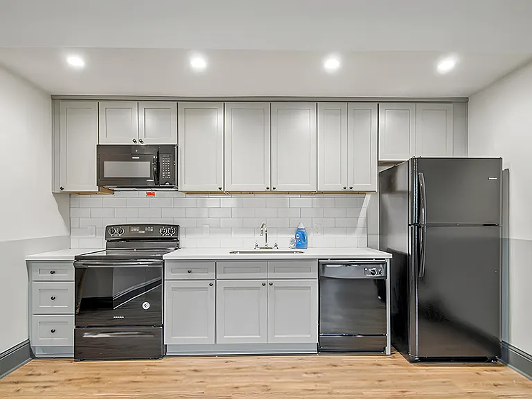 Beautiful kitchen with all new appliances and stocked with basic equipment