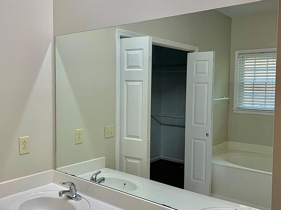 Master Double Sinks With Walk-In Closet