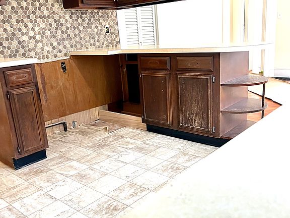 Kitchen is in the process of a face lift. Kitchen cabinets are in for processes of resurfacing and new range and dishwasher are on the way!