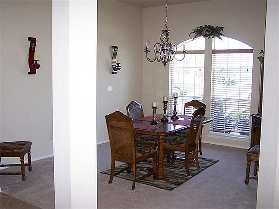 Living room is currently being used as dining room...