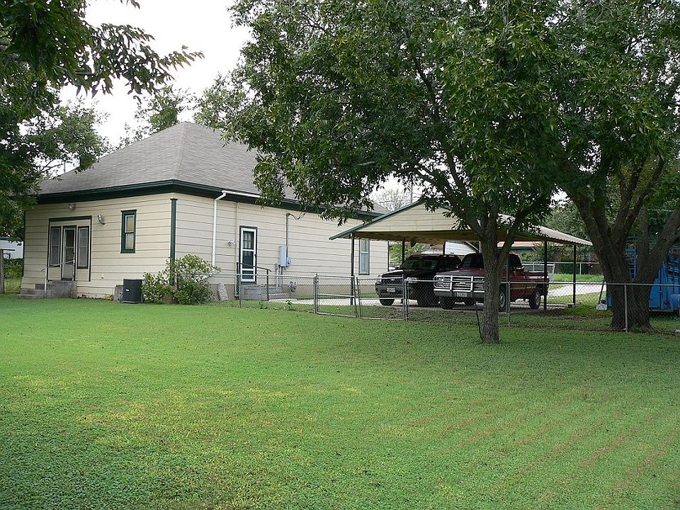 Back Side/Side view of House