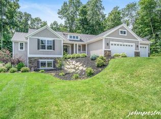 8465 Camelot Dr NE, Rockford, MI 49341