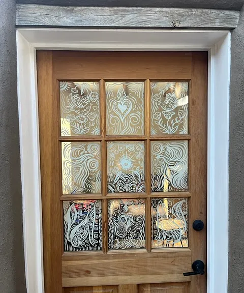Hand painted front door of casita.