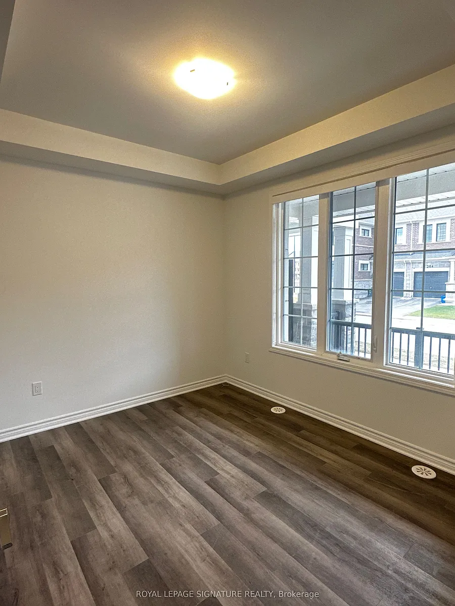 Building Photo - 1259 Lily Cres #12