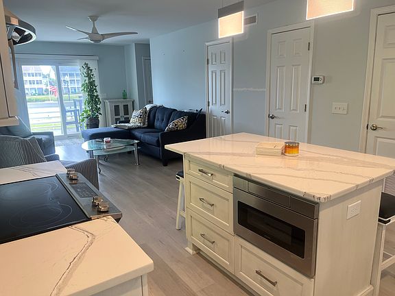 Open floor plan from kitchen to living area.