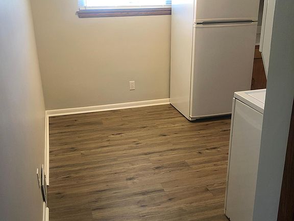 Kitchen has plenty of light and an area for your dining table.