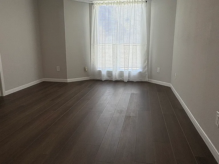 Master bedroom looking out to the backyard and nature