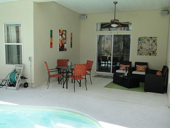 3rd image of 5993 LAWSONIA LINKS DR W