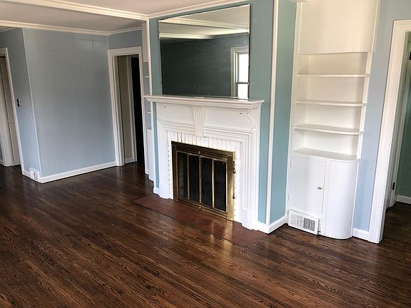 Fireplace and built in bookshelves