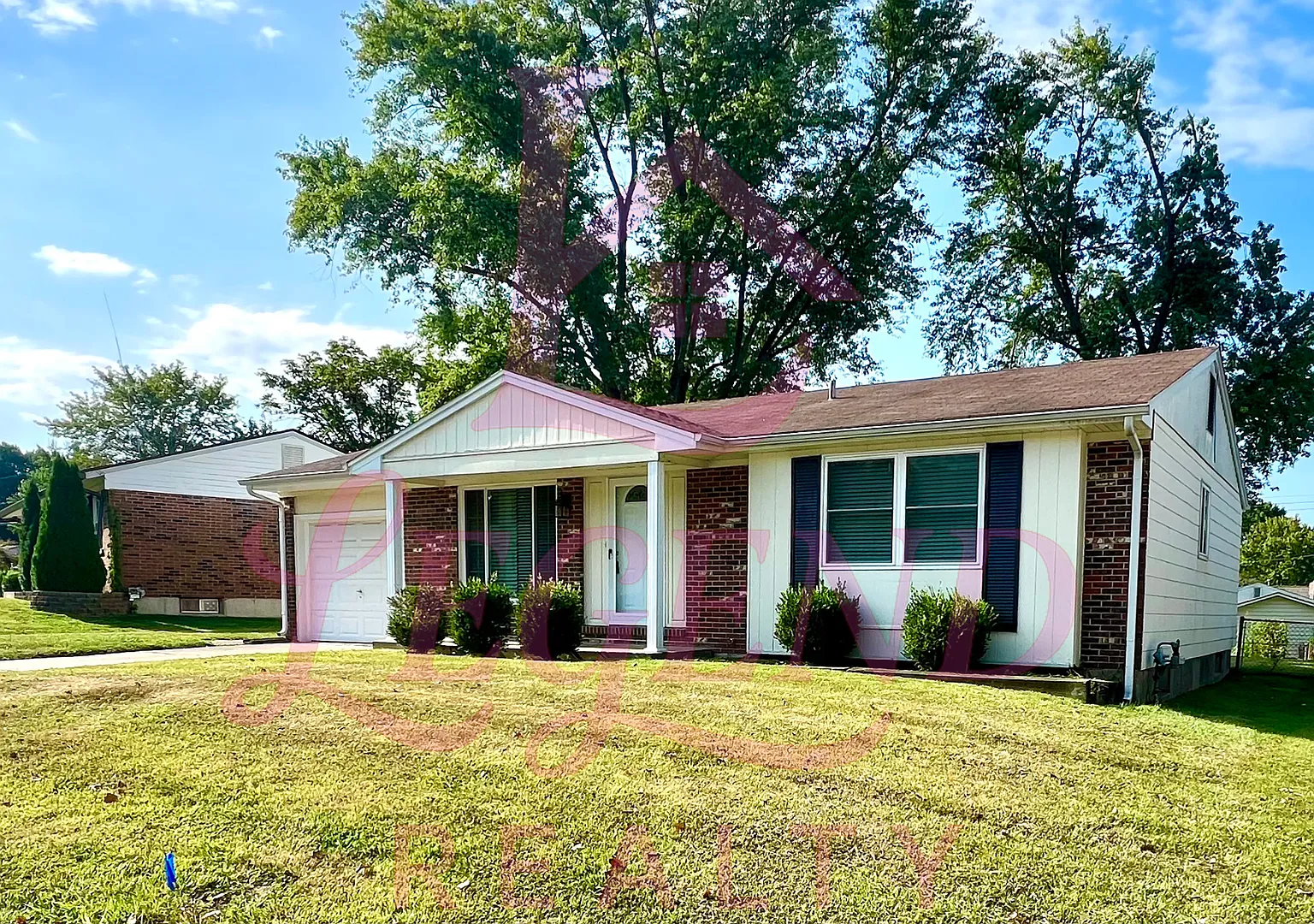 Updated 3-Bedroom Home with a 1 Car Garage & Fenced Yard in St. Charles! — Photo 1
