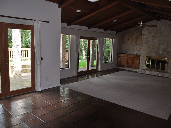 Open Floor Plan, with Stone, Wood, and Natural Light