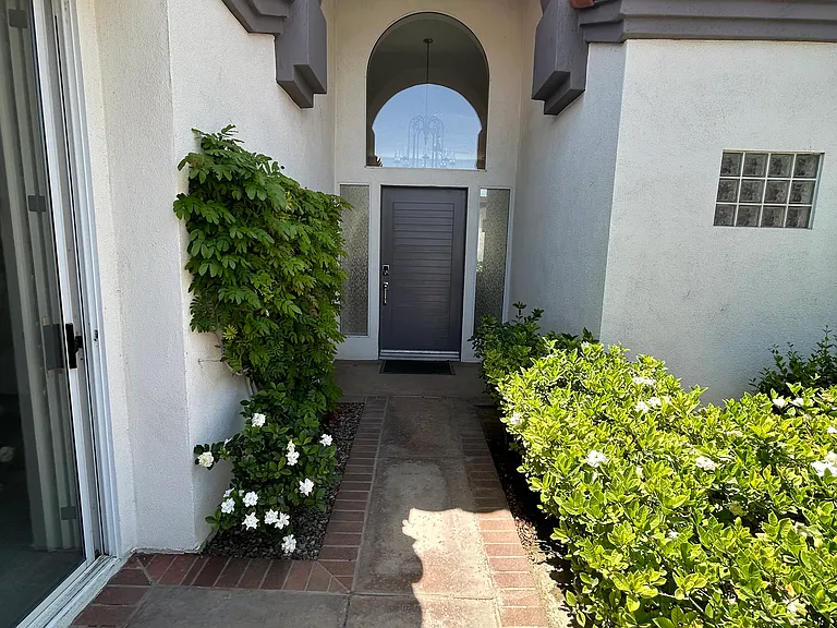 private, locked and gated courtyard, leading to front door of residence