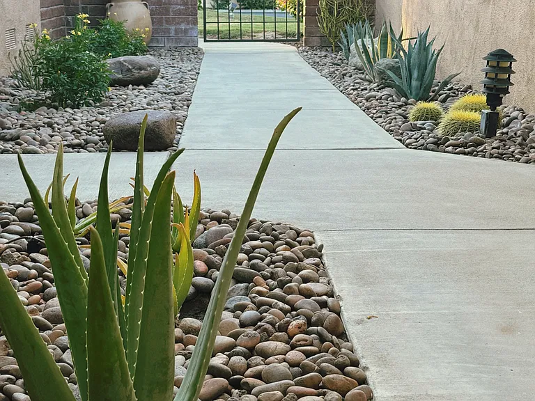 Newly landscaped and automatically irrigated entry