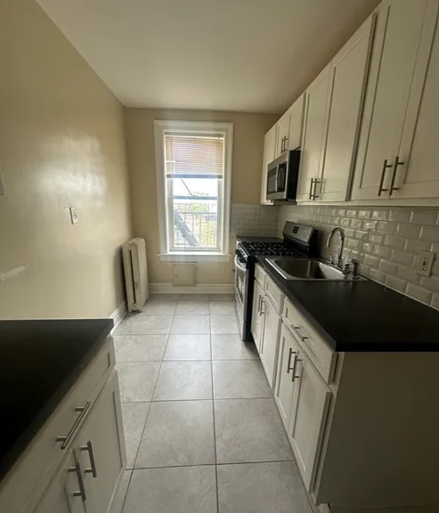 125-127 Corbin Ave #303C — Photo 1