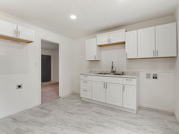 5th image of 11312 Ditman Ave