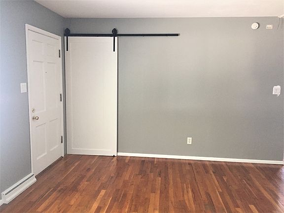 Coat closet with barn door