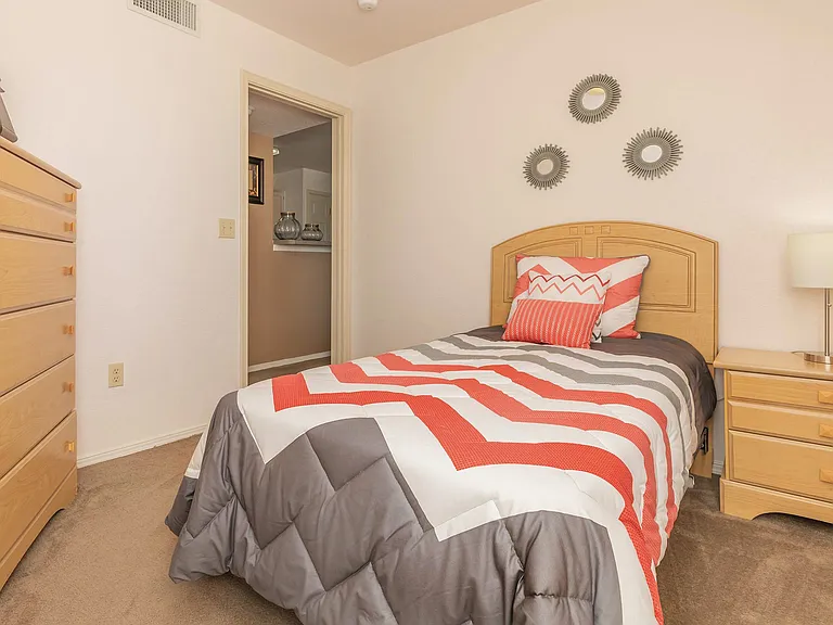 Cozy Bedroom with Red Accents
