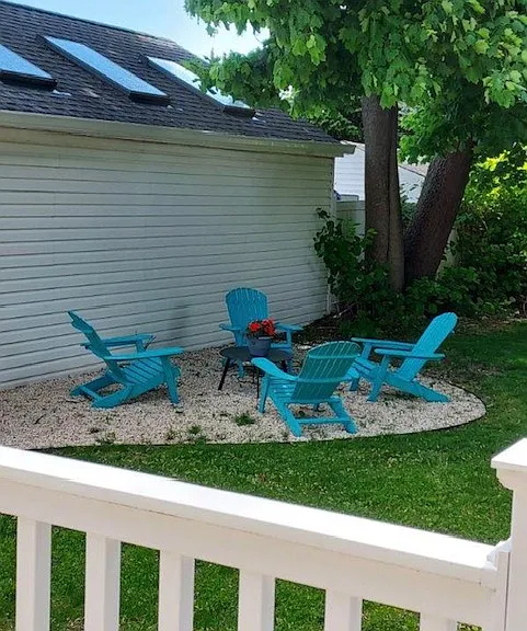 One of 3 backyard lounge areas
