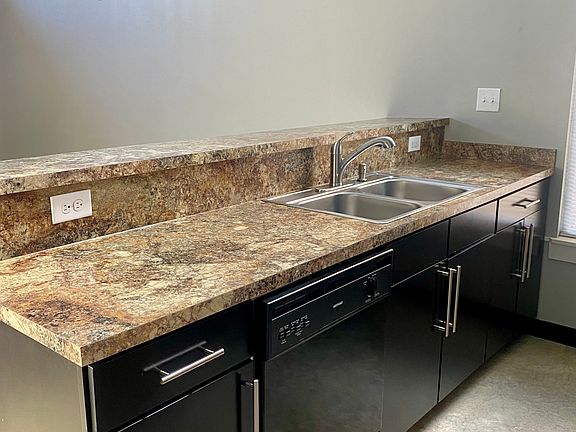 Kitchen with breakfast bar.