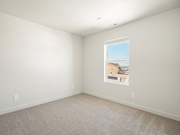 The residence 5 floorplan interior image taken at a Meritage Homes Community in West Haven, UT.