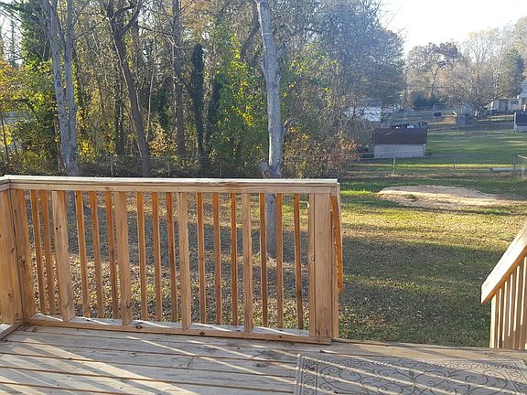 deck & fenced backyard