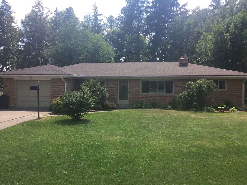 Front of house with new roof