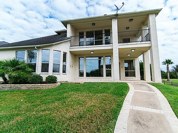 View of the house from the dock on the lake