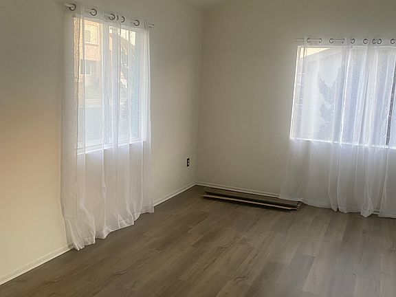 living room with vaulted ceiling