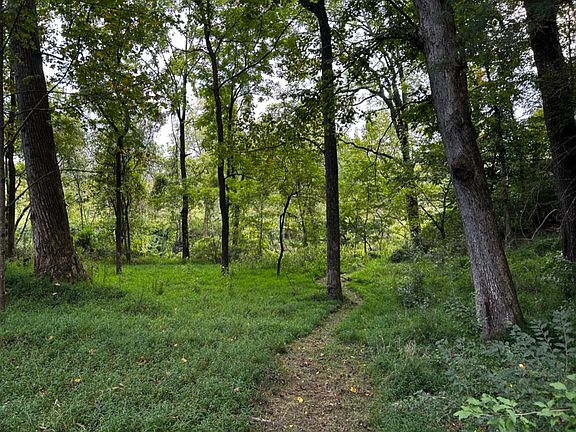 Private backyard path leading to Hominy Creek Greenway