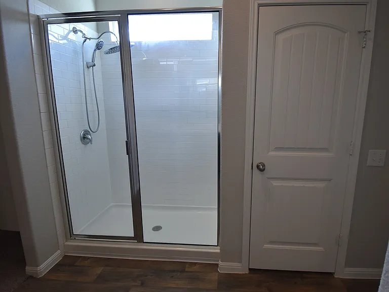 Walk-in Shower and linen closet