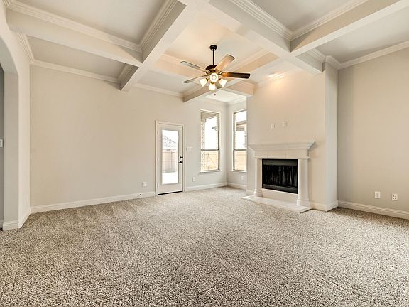 Great room with view to backyard and porch