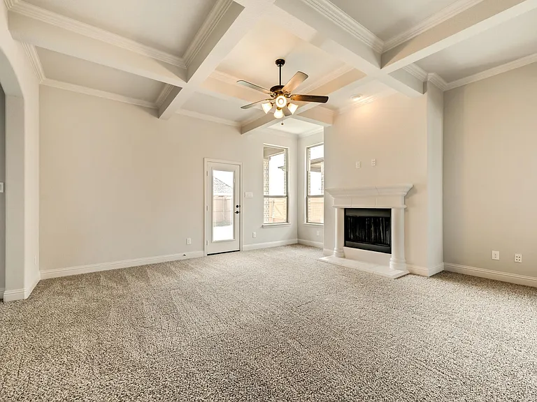 Great room with view to backyard and porch
